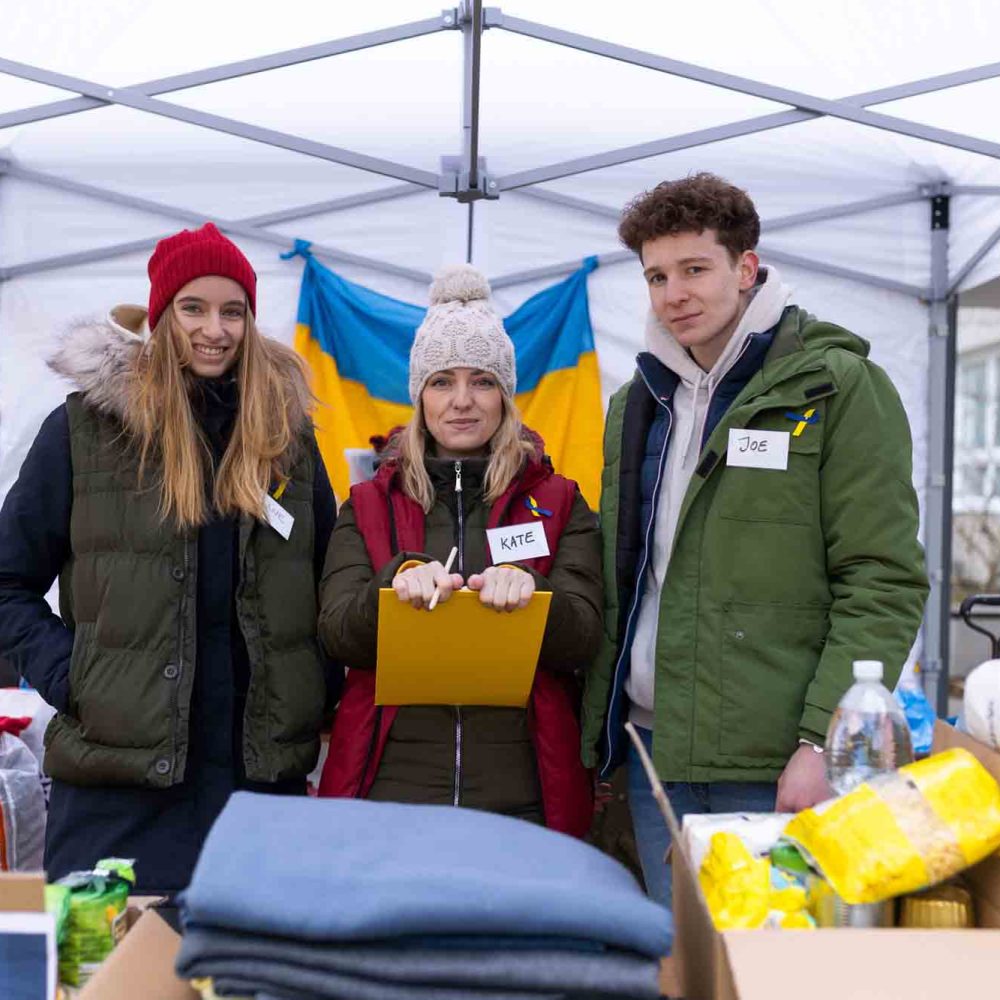 The team of volunteers distributing food, drinks and other donations to refugees on the Ukrainian border.